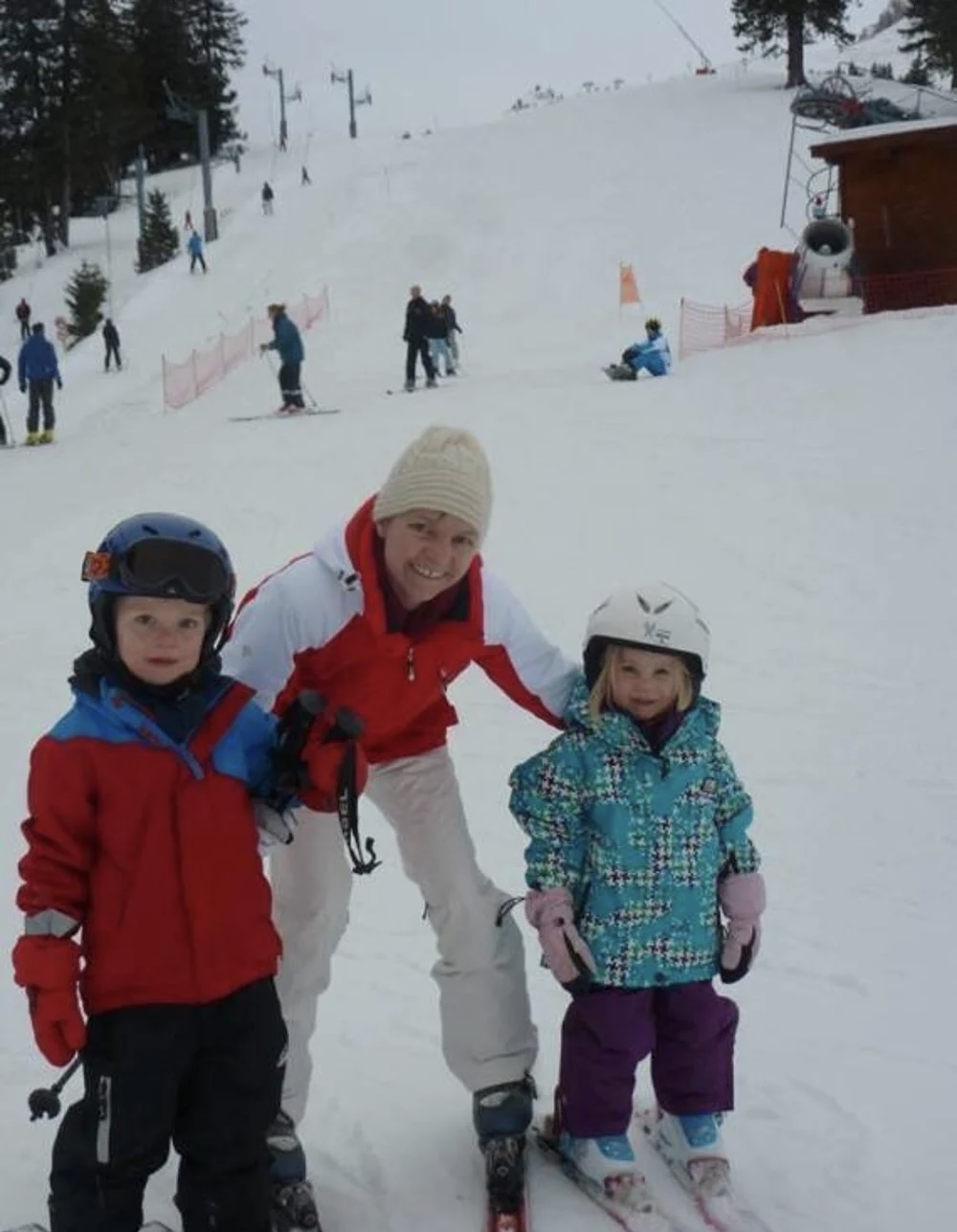 Charlotte at the top of the slope with Danny and Lucy in their helmets