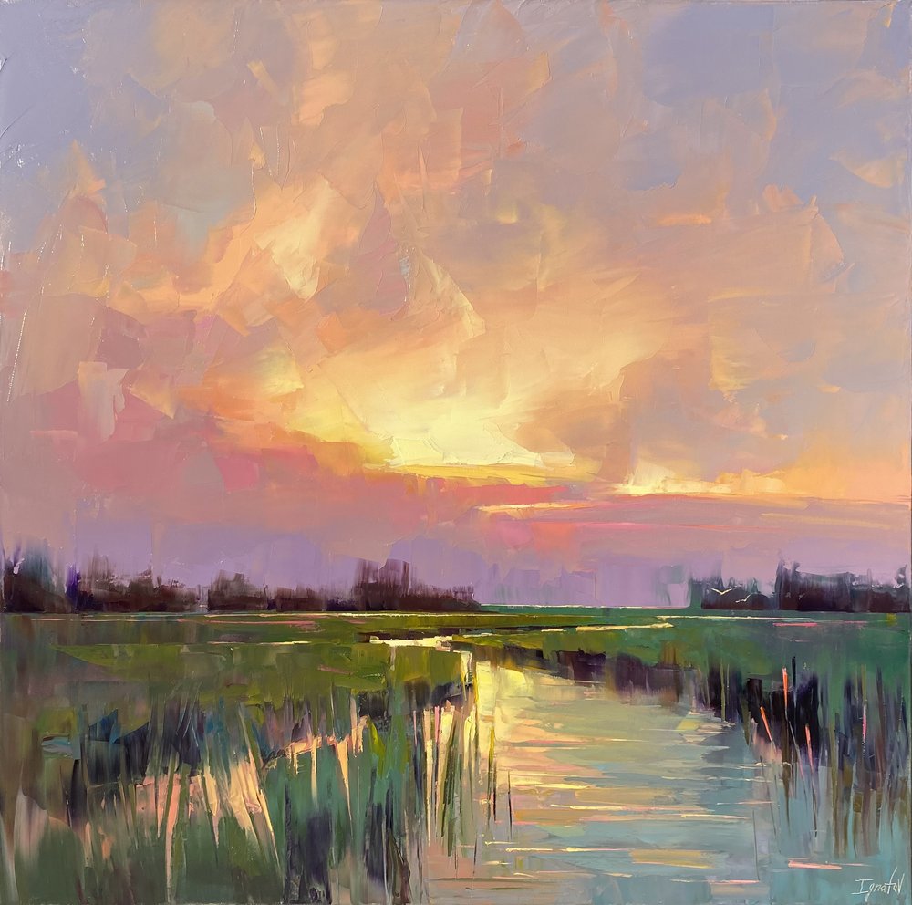 A golden-pink sky over still green wetlands at sunset, a stream of light reflected on the water — Ignatov